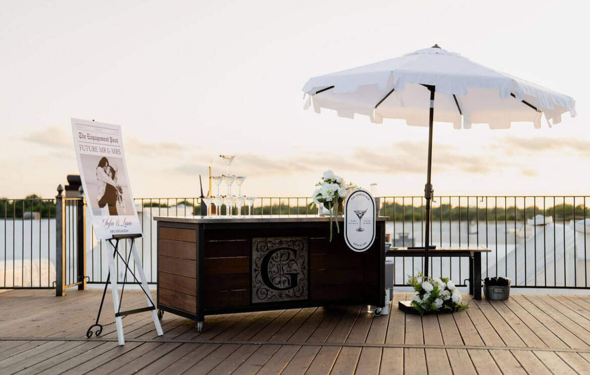 Rooftop ceremony with petals on the aisle and guests seated